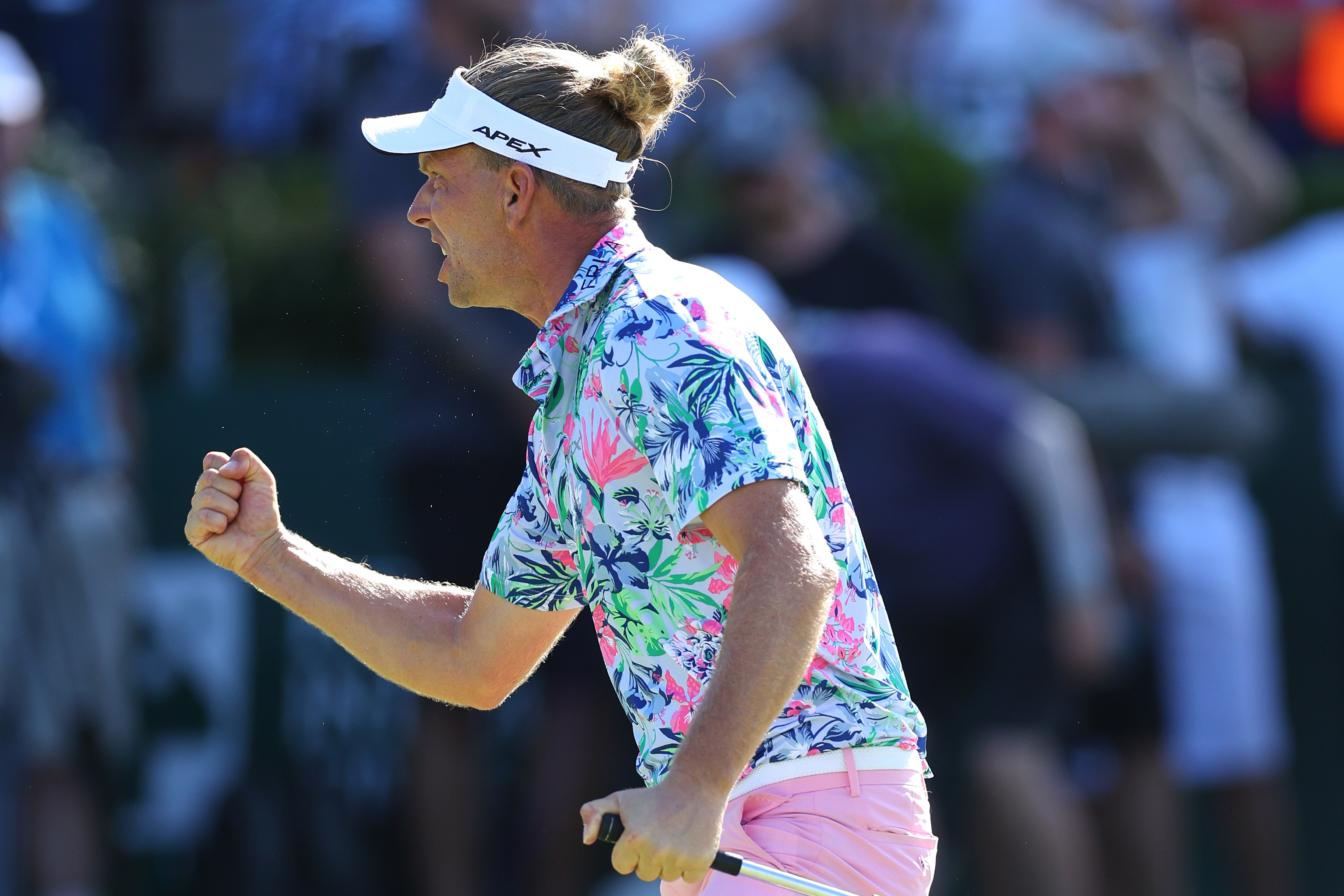 Marcel Siem's manbun and floral shirt