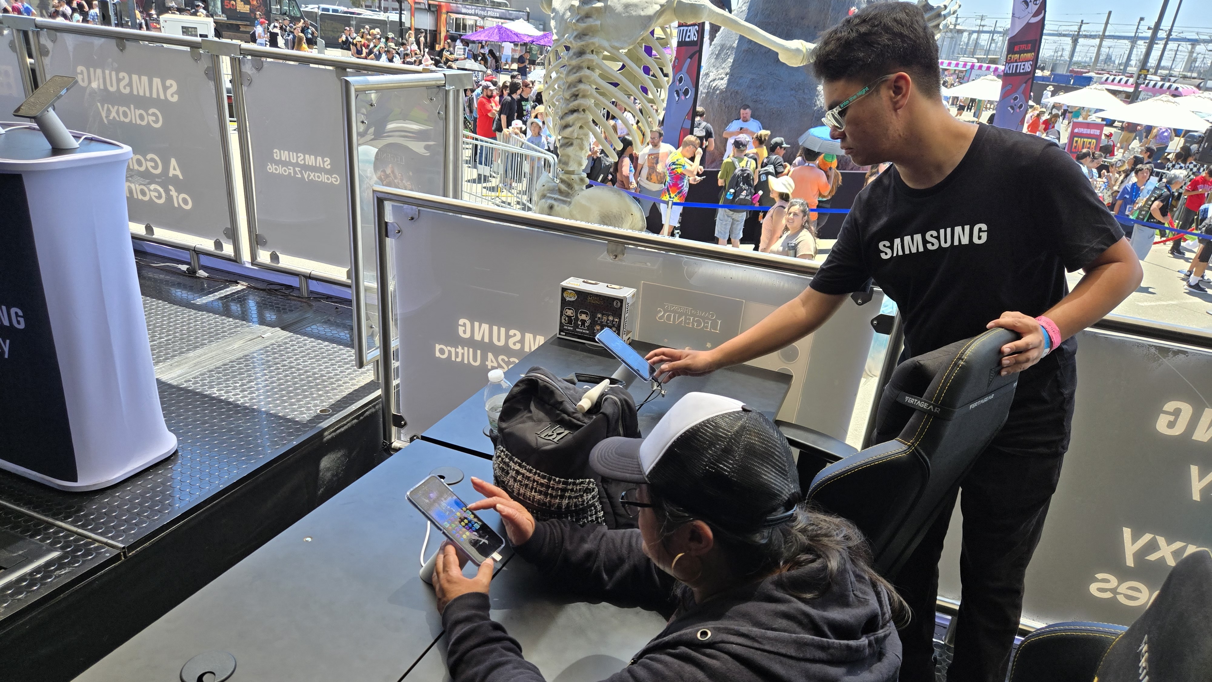 Someone playing a game at Samsung's Comic-Con booth