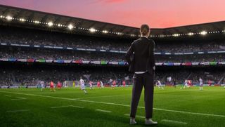 Football Manager key art - manager of a football team watching play on the field