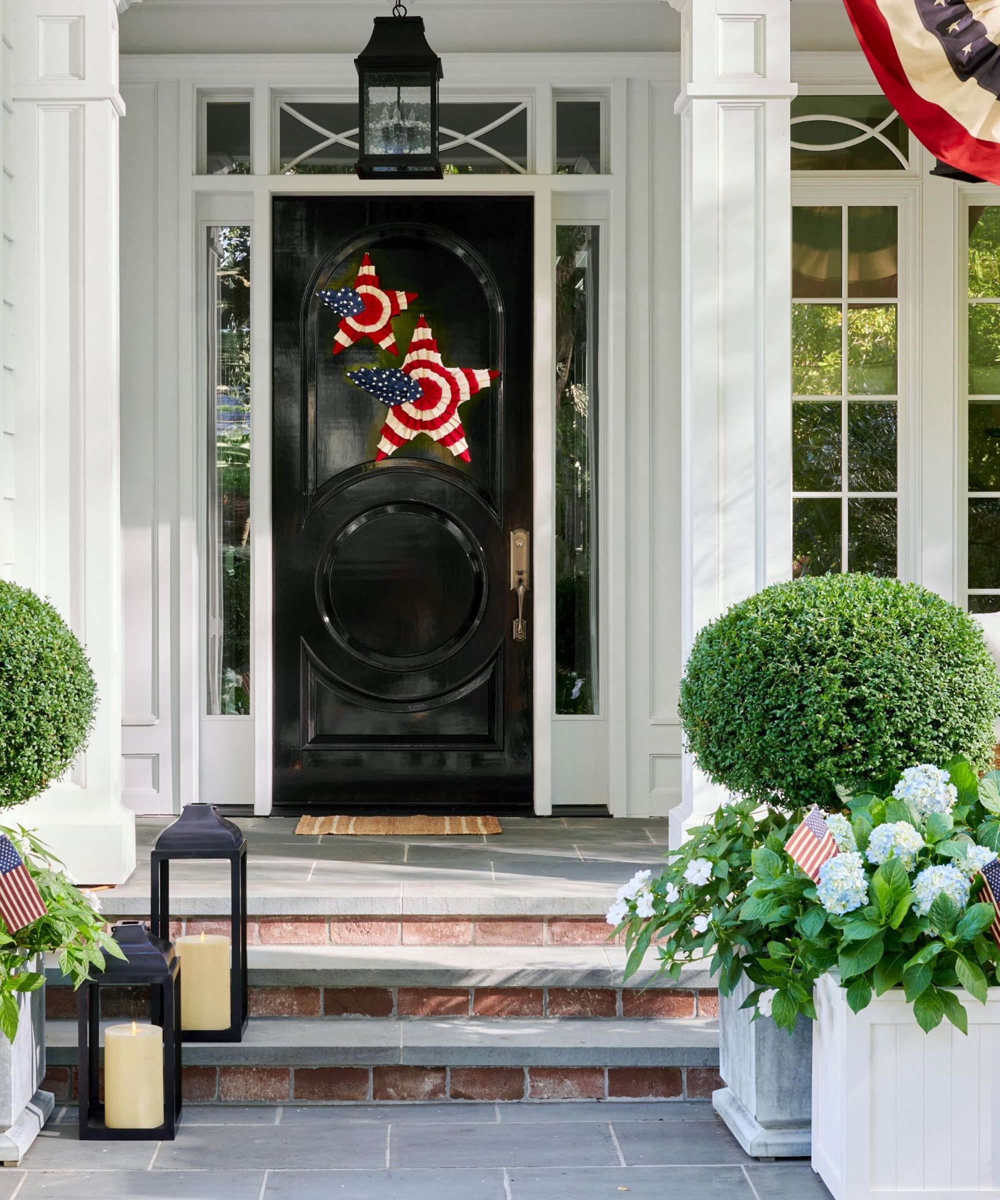 a porch decorated for 4th of July