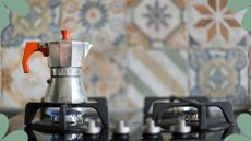 picture of moka pot on gas stove
