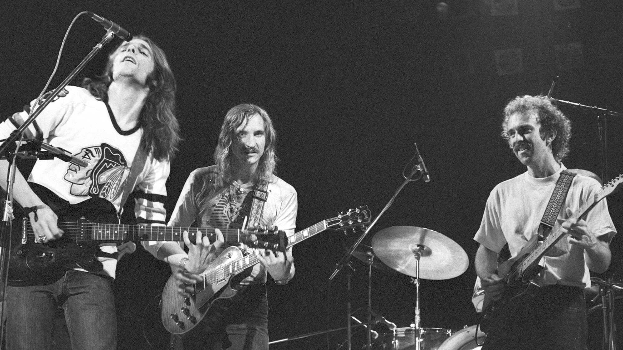 The Eagles perform on stage in Amsterdam, Netherlands, 1975. (L-R) Glenn Frey, Joe Walsh, Bernie Leadon