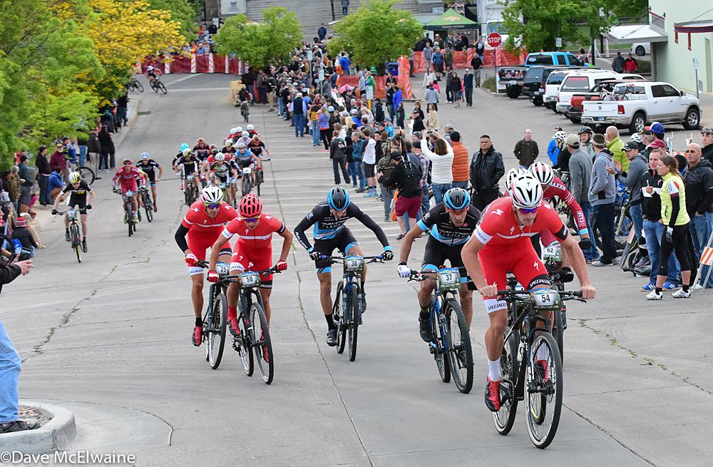Sam Gaze (Specialized) creating a split in the peloton on lap three