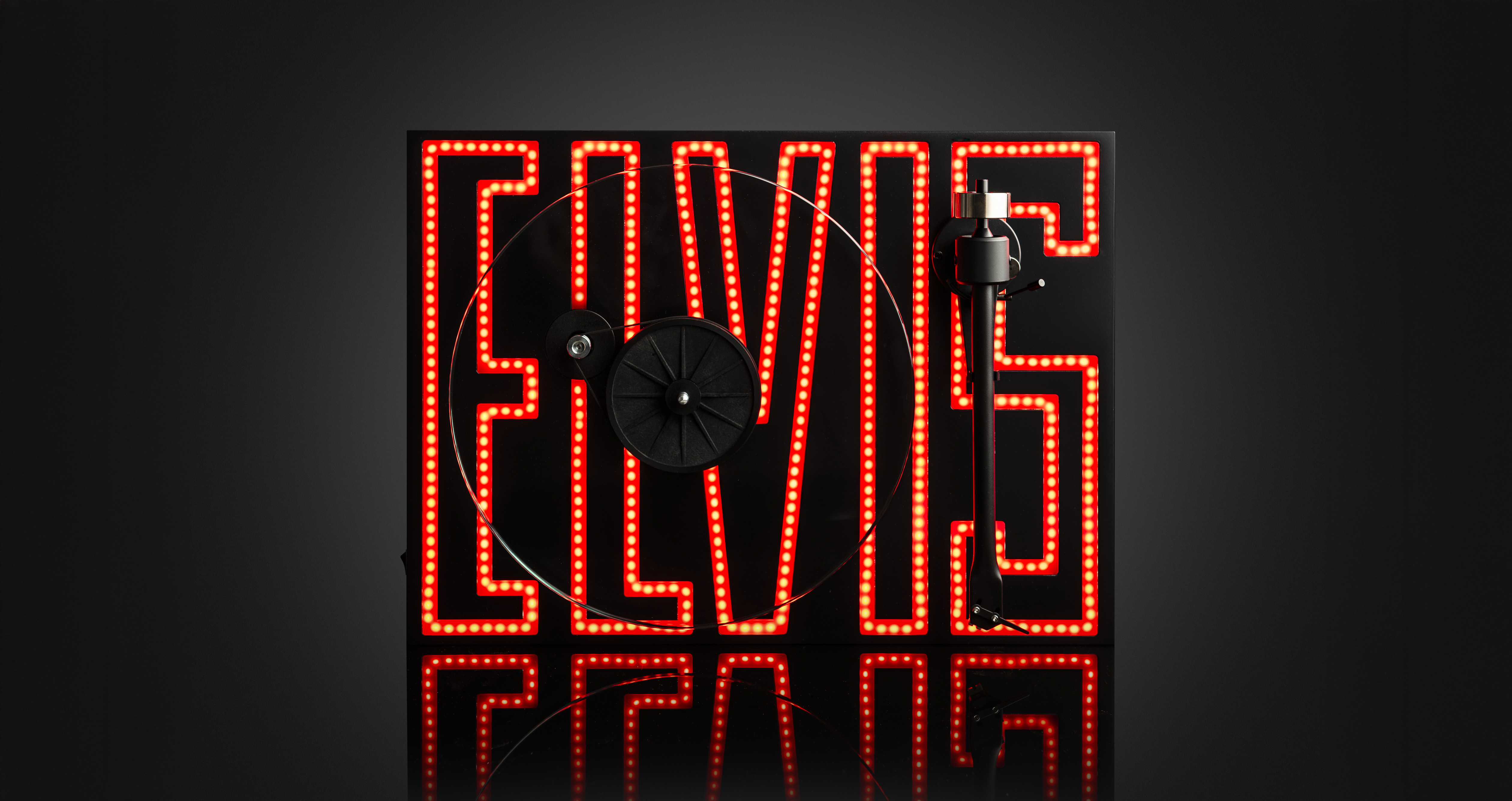 Pro-Ject's Elvis-themed turntable on black background