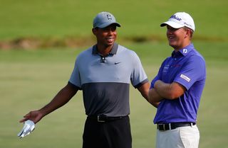 Tiger Woods and Tom Hoge chat during the 2015 Wyndham Championship