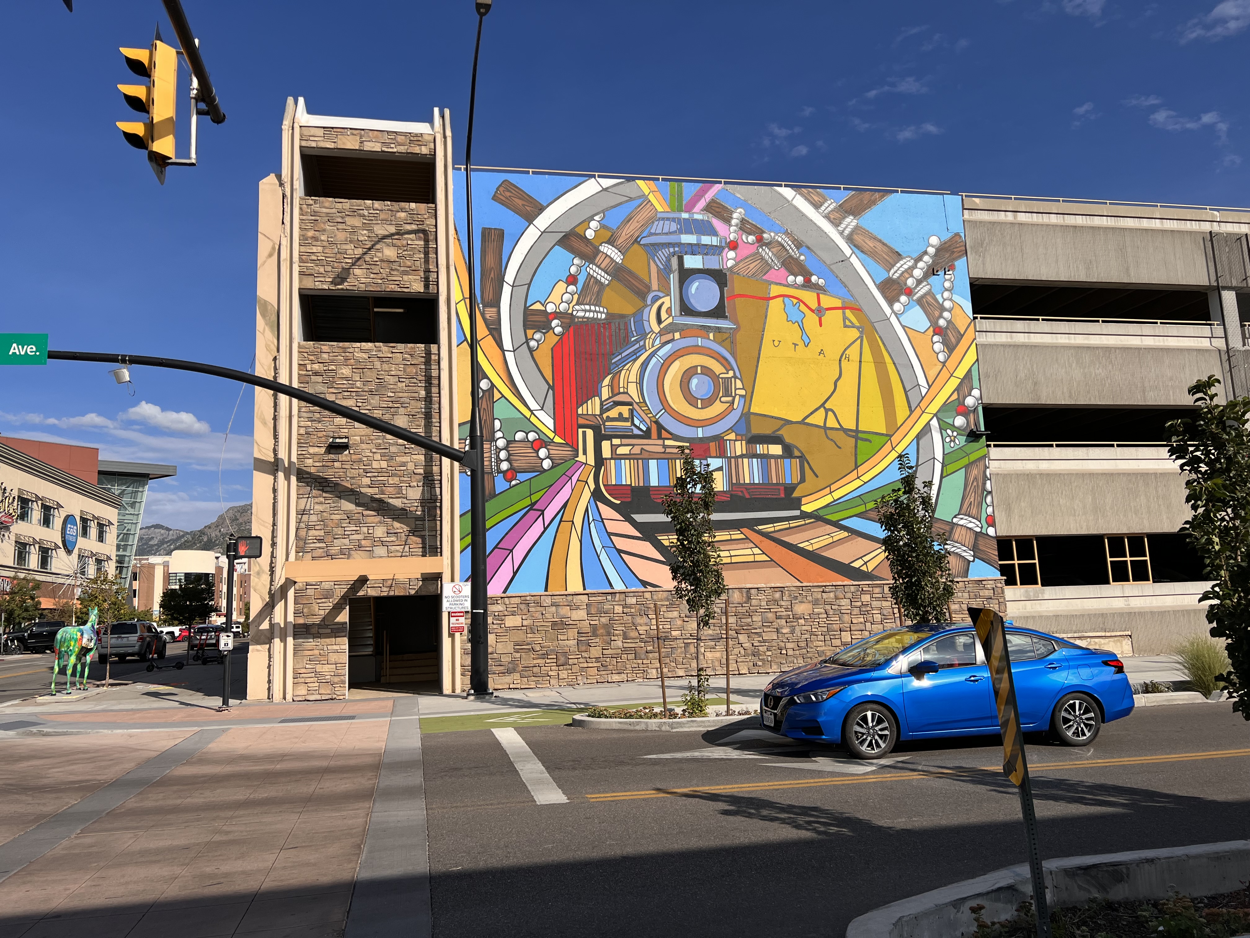 photo of a mural and car in the warm photographic style