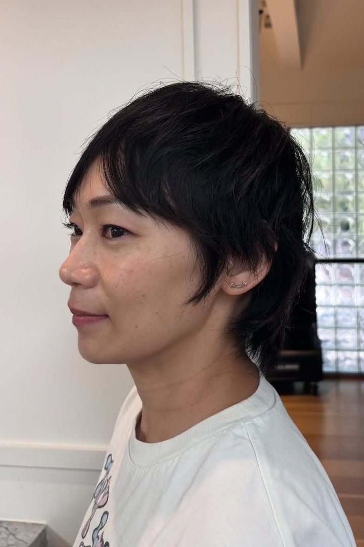 A model shows off their new bixie cut by Isabella Sementilli.