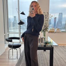 olympia gayot wears a blue cashmere jumper