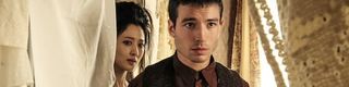 Claudia Kim and Ezra Miller as Nigini and Credence in Fantastic Beasts The Crimes of Grindelwald
