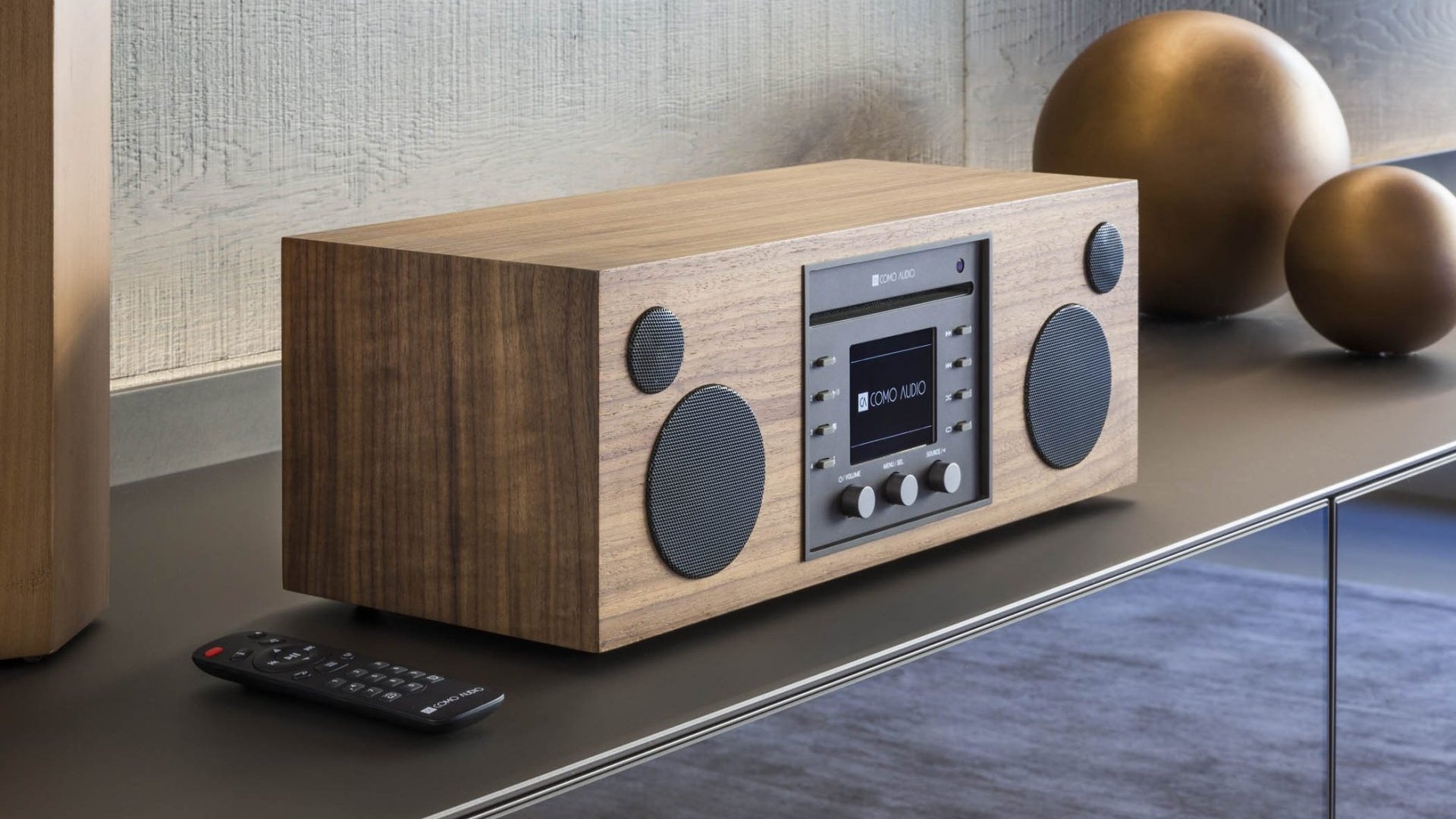 Como Audio Musica Wireless Music System in walnut finish on a table