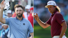 Jon Rahm and Cameron Smith both wave to the crowds after holing a putt