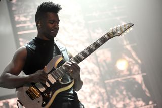 Tosin Abasi using the TAM100 8-string onstage with Animals As Leaders in early 2015