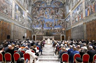 Pope Francis leaving the Sistine Chapel with Bjarke Ingels on the left