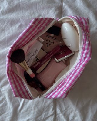 Coco Weekend's bag filled with beauty products.