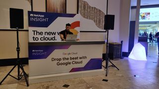 DJ booth branded by google cloud at MGM grand conference center for NetApp insight 2024