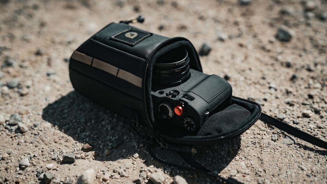 The PolarPro RoadRunner Sling with a compact camera