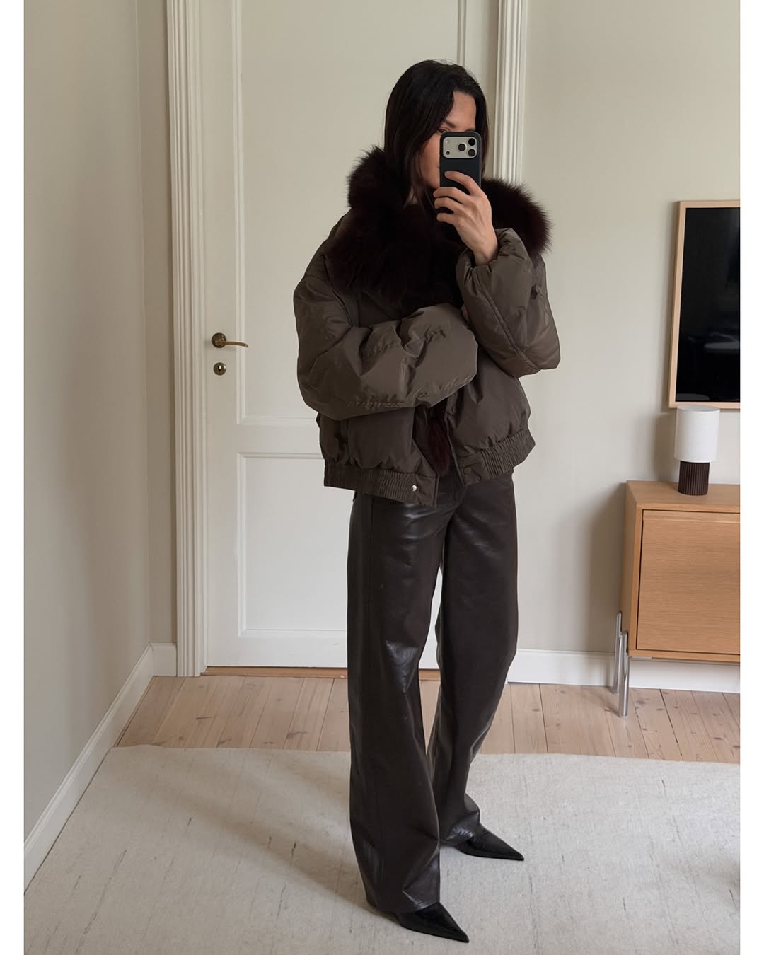 woman wearing brown faux fur coat 2026