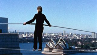 Philippe Petit walking on wire in Man on Wire