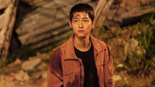 A scene from "Bogota: City of the Lost" featuring lead actor Song Joong-ki