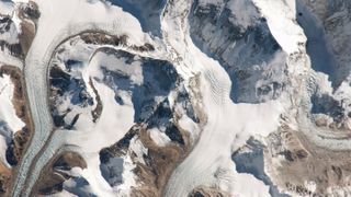 An astronaut photograph of the East Rongbuk Glacier on the Tibetan Plateau.