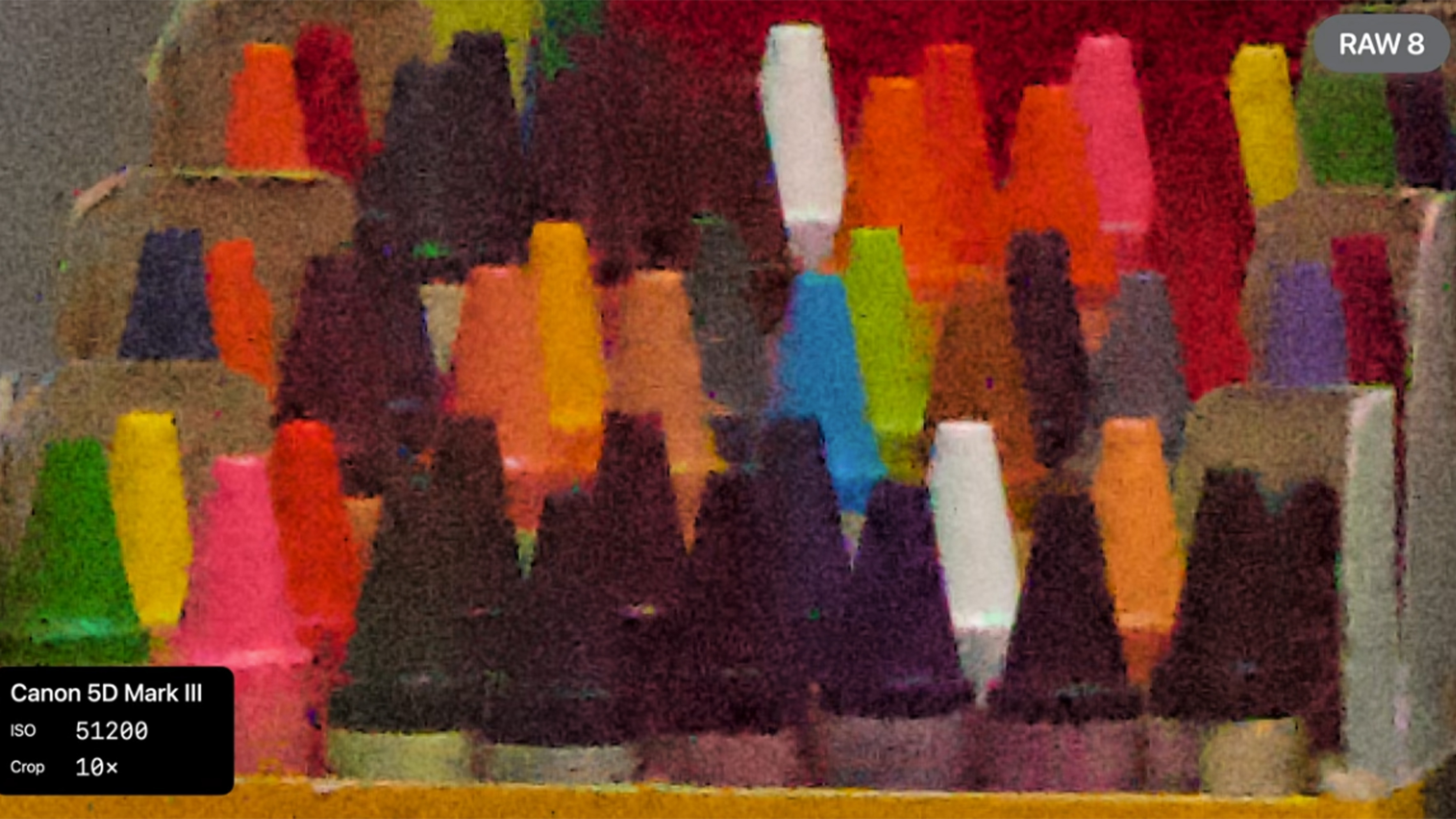 Multicolored crayons and yarn