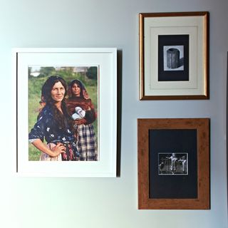grey wall with photo frames