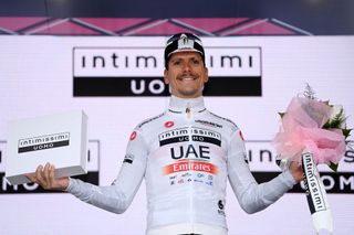 VIAREGGIO ITALY MAY 16 Joo Almeida of Portugal and UAE Team Emirates White Best Young Rider Jersey celebrates at podium during the 106th Giro dItalia 2023 Stage 10 a 196km stage from Scandiano to Viareggio UCIWT on May 16 2023 in Viareggio Italy Photo by Tim de WaeleGetty Images