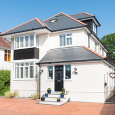 exterior with white wall and grey roof