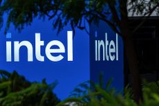Blue signage with white letters spelling out "Intel" at company headquarters in San Jose, California, US, on Thursday, Sept. 18, 2025.