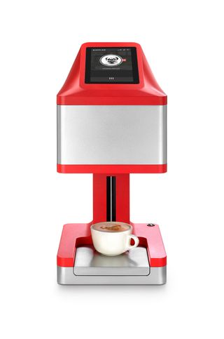 The Ripple Maker machine is designed to draw a pretty picture on top of your cappuccino froth.