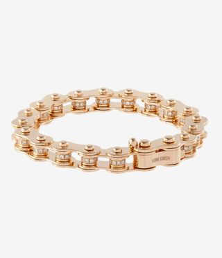 Gold bicycle chain bracelet by Nadine Ghosn