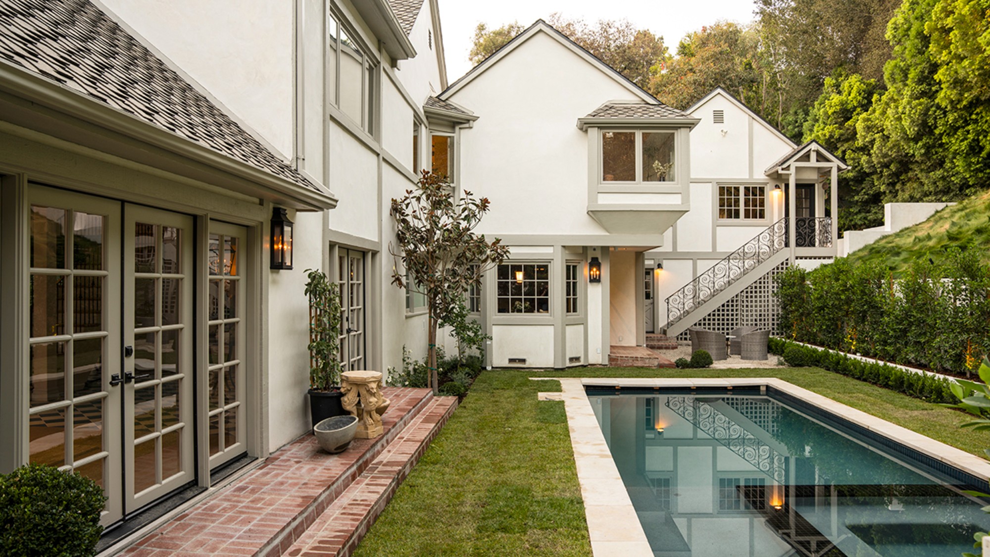 Exterior of a 1972 Tudor-inspired home in the Brentwood hills about 17 miles from downtown