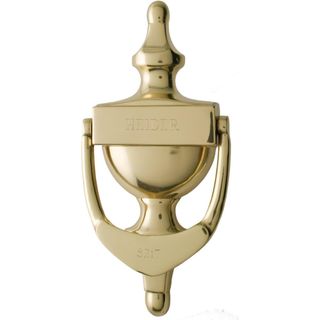 A brass door knocker