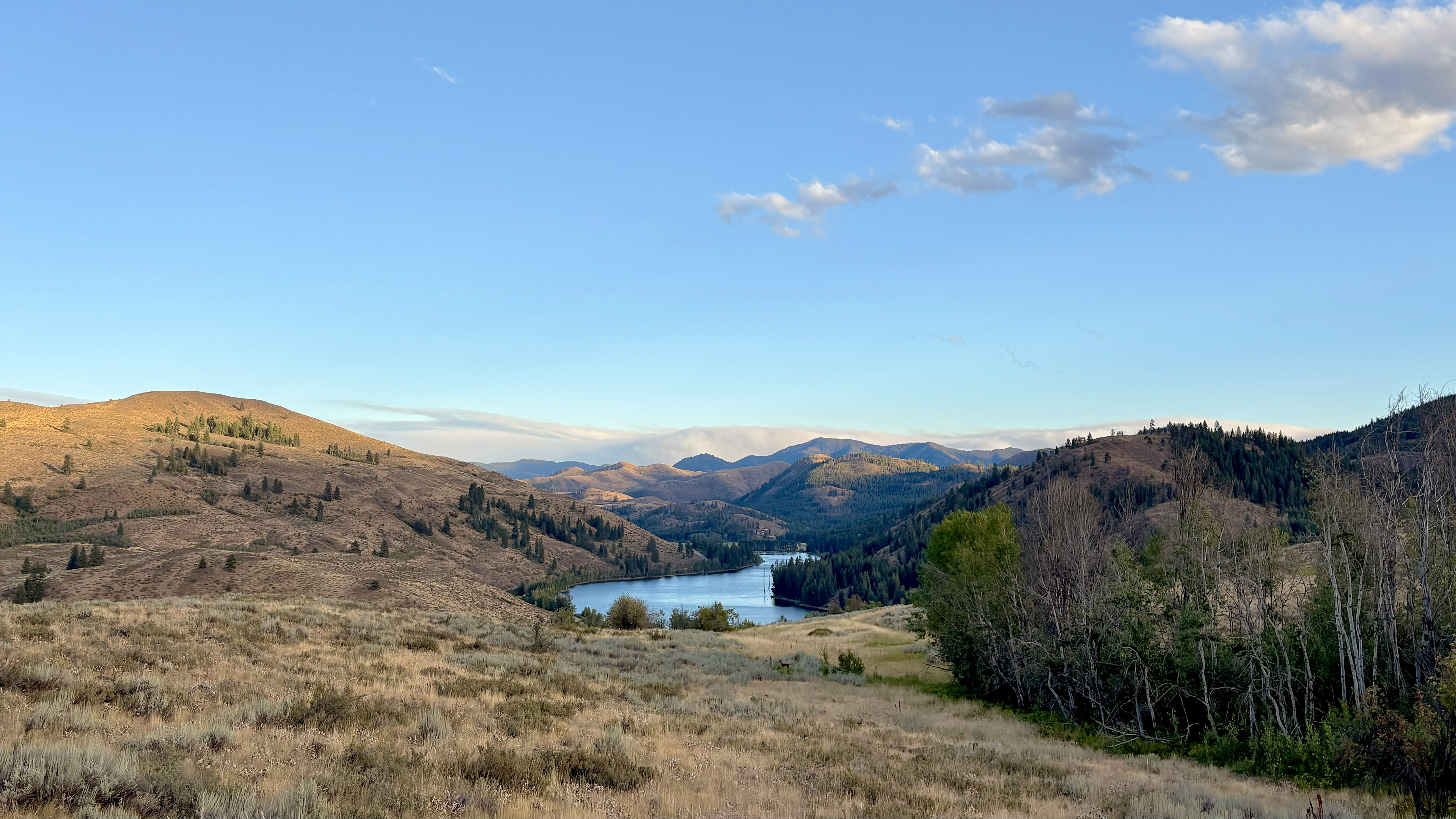 Landscape shot of the Cascade Mountains with a lake in the center of the frame
