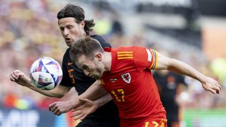 Rhys Norrington-Davies of Wales, Hans Hateboer of Netherlands during the UEFA Nations League League A Group 4 match between Wales and Netherlands
