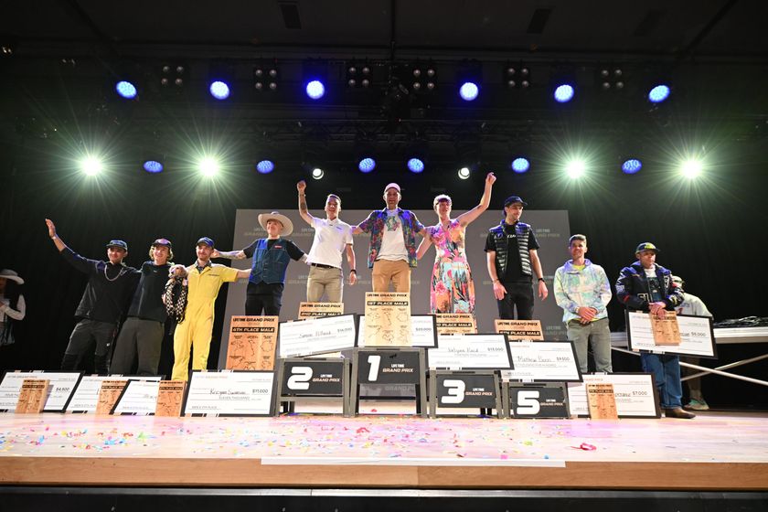 The top 10 elite men in the 2025 Life Time Grand Prix celebrate at an awards ceremony at The Momentary in Bentonville, Arkansas