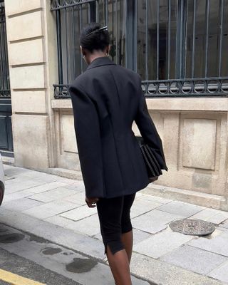 Woman wearing an elegant tailored blazer.