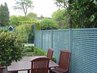 jacksons fencing fence painted in blue-grey