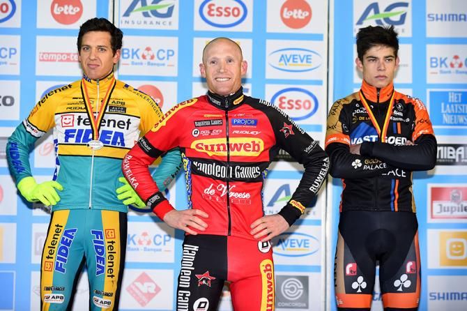 Klaas Vantornaout on the podium with Tom Meeusen and Wout Van Aert.