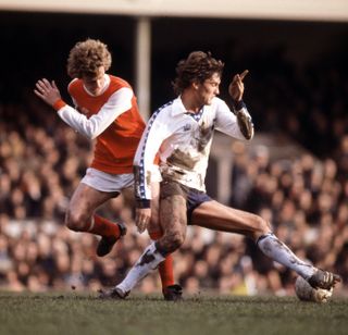 Arsenal's Graham Rix (left) challenges Tottengham's Glenn Hoddle in a North London derby in December 1979.