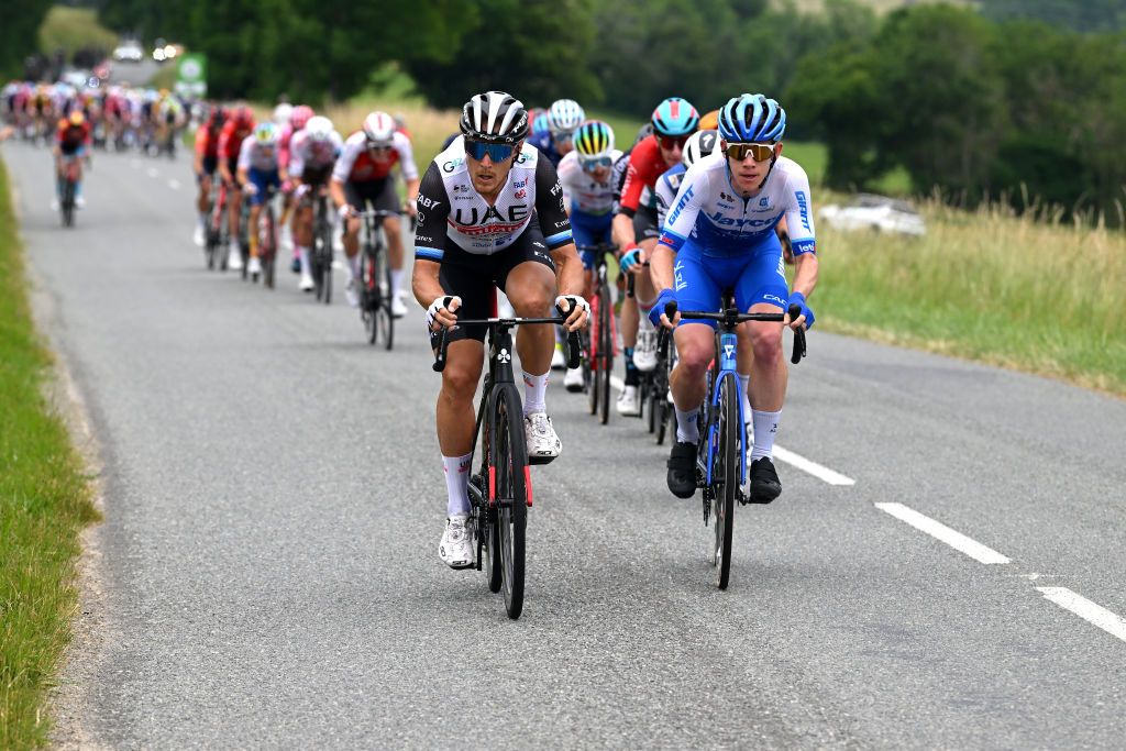CRESTVOLAND FRANCE JUNE 09 LR Matteo Trentin of Italy and UAE Team Emirates and Lawson Craddock of The United States and Team Jayco AlUla attack during the 75th Criterium du Dauphine 2023 Stage 6 a 1702km stage from Nantua to CrestVoland 1218m UCIWT on June 09 2023 in CrestVoland France Photo by Dario BelingheriGetty Images