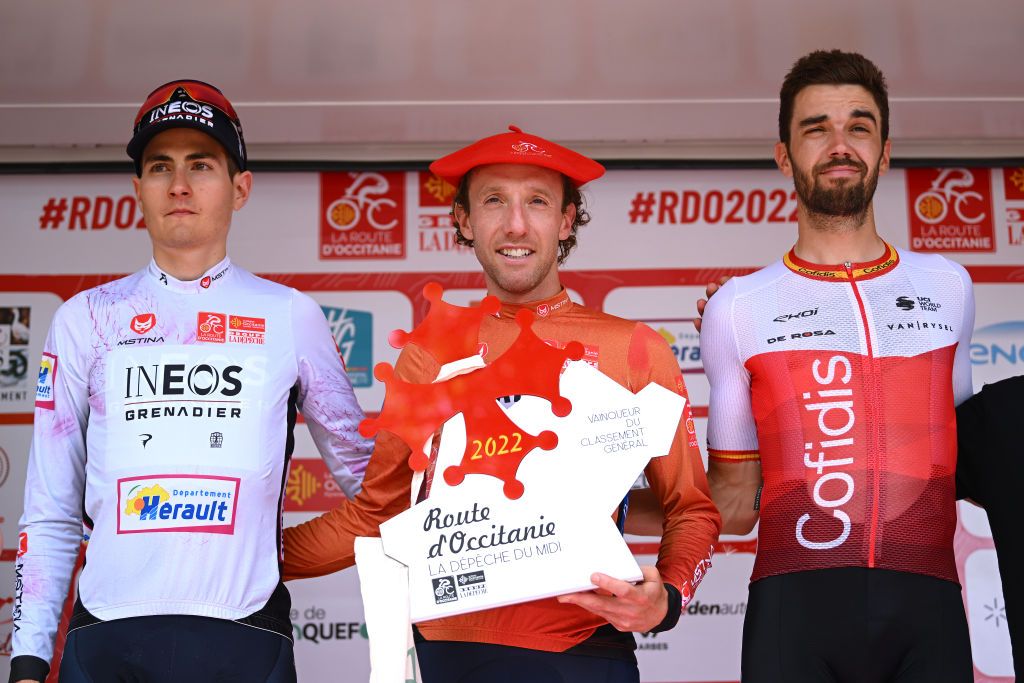 AUTERIVE FRANCE JUNE 19 LR Carlos Rodriguez Cano of Spain and Team INEOS Grenadiers White Best Young Rider Jersey on second place race winner Michael Woods of Canada and Team Israel Premier Tech Red Leader Jersey and Jess Herrada Lopez of Spain and Team Cofidis on third place pose on the podium ceremony after the 46th La Route dOccitanie La Depeche du Midi 2022 Stage 4 a 1883km stage from Les Angles to Auterive RDO2022 on June 19 2022 in Auterive France Photo by Dario BelingheriGetty Images