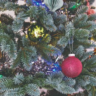 A Christmas tree decorated with baubles