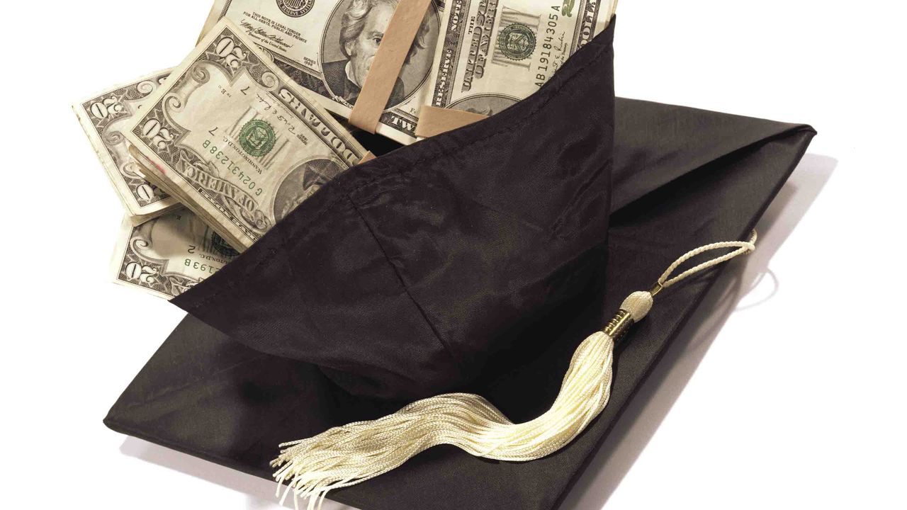 Photo of a graduation cap with cash in it