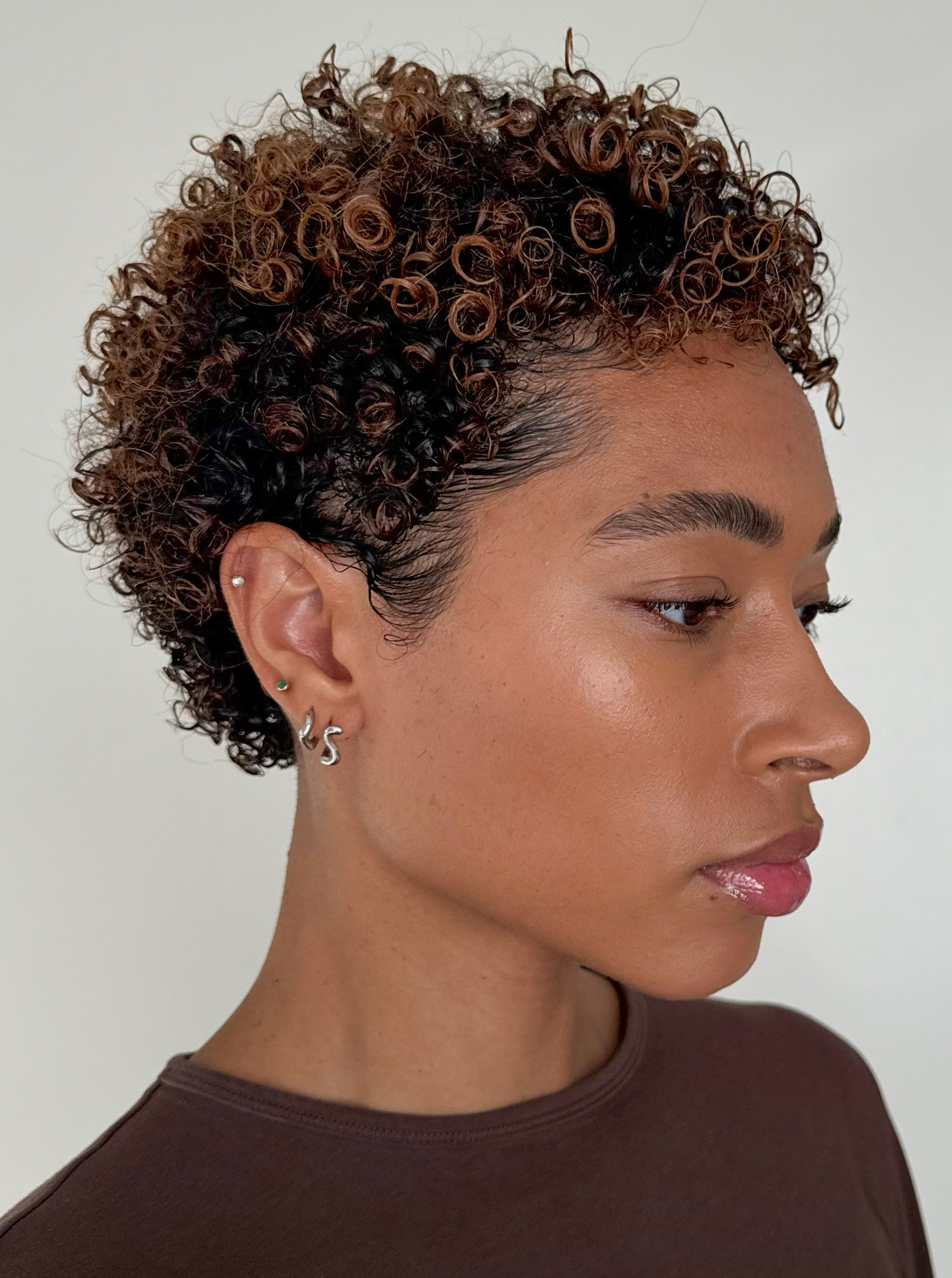Content creator Lesley Buckle showcases her short curly hair