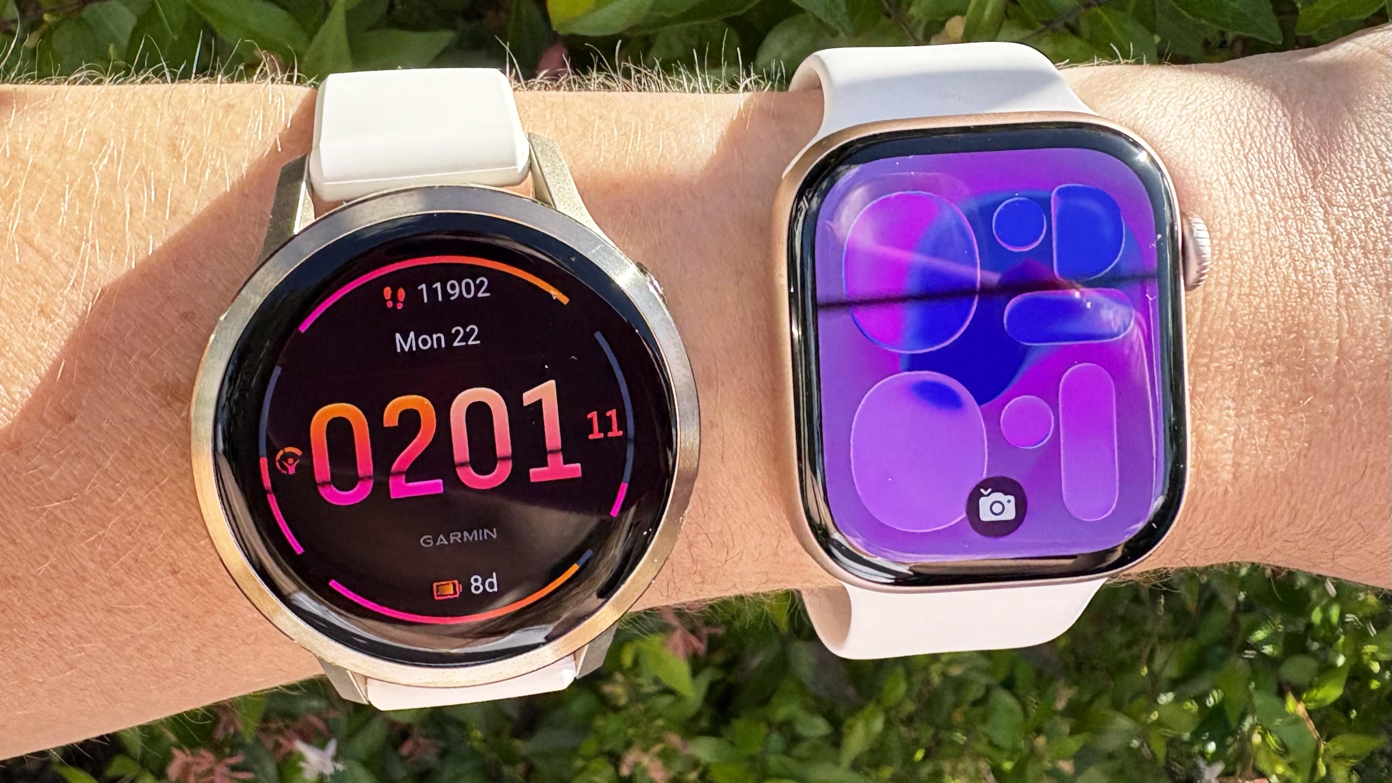 a photo of the Garmin Venu 4 and Apple Watch 11