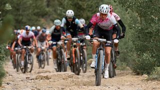 Keegan Swenson leads the pack on a climb at the Leadville Trail 100 MTB race