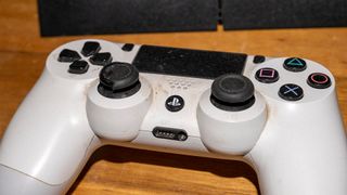 A photo of a dirty PS4 DualShock controller
