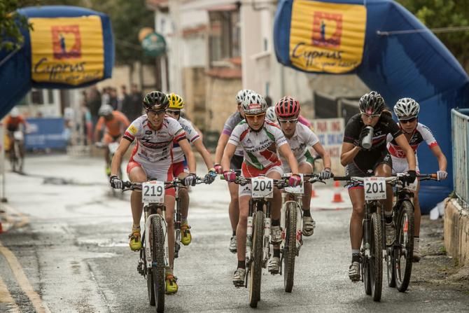 The elite women race around the start loop