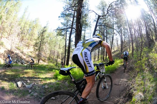 Geoff Kabush (Scott 3Rox Racing) riding switchbacks behind Bishop